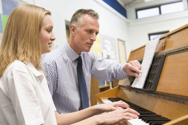 Using Teachers Companion and FileMaker Pro to teach piano with music sheets